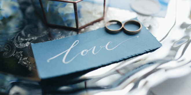 wedding-rings-at-wedding-invitation-with-decoratio-2023-11-27-05-30-44-utc